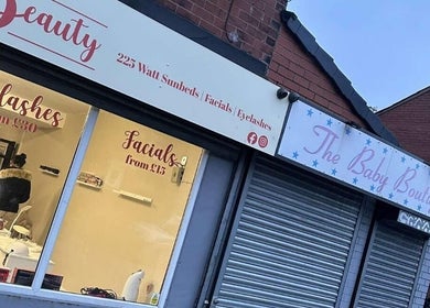 Charming entrance of Enchantedbykait in Farnworth, England, GB highlighting beauty services.