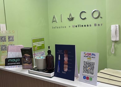 Ai Co. Infusion + Wellness Bar reception area in Taguig, Metro Manila, PH with payment options displayed.