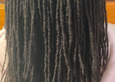 Beautiful locs styled at 🩷LocsOfLove🖤 in Redhill, England, GB, showcasing intricate craftsmanship and care.