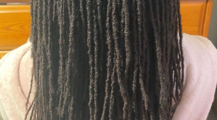 Beautiful locs styled at 🩷LocsOfLove🖤 in Redhill, England, GB, showcasing intricate craftsmanship and care.