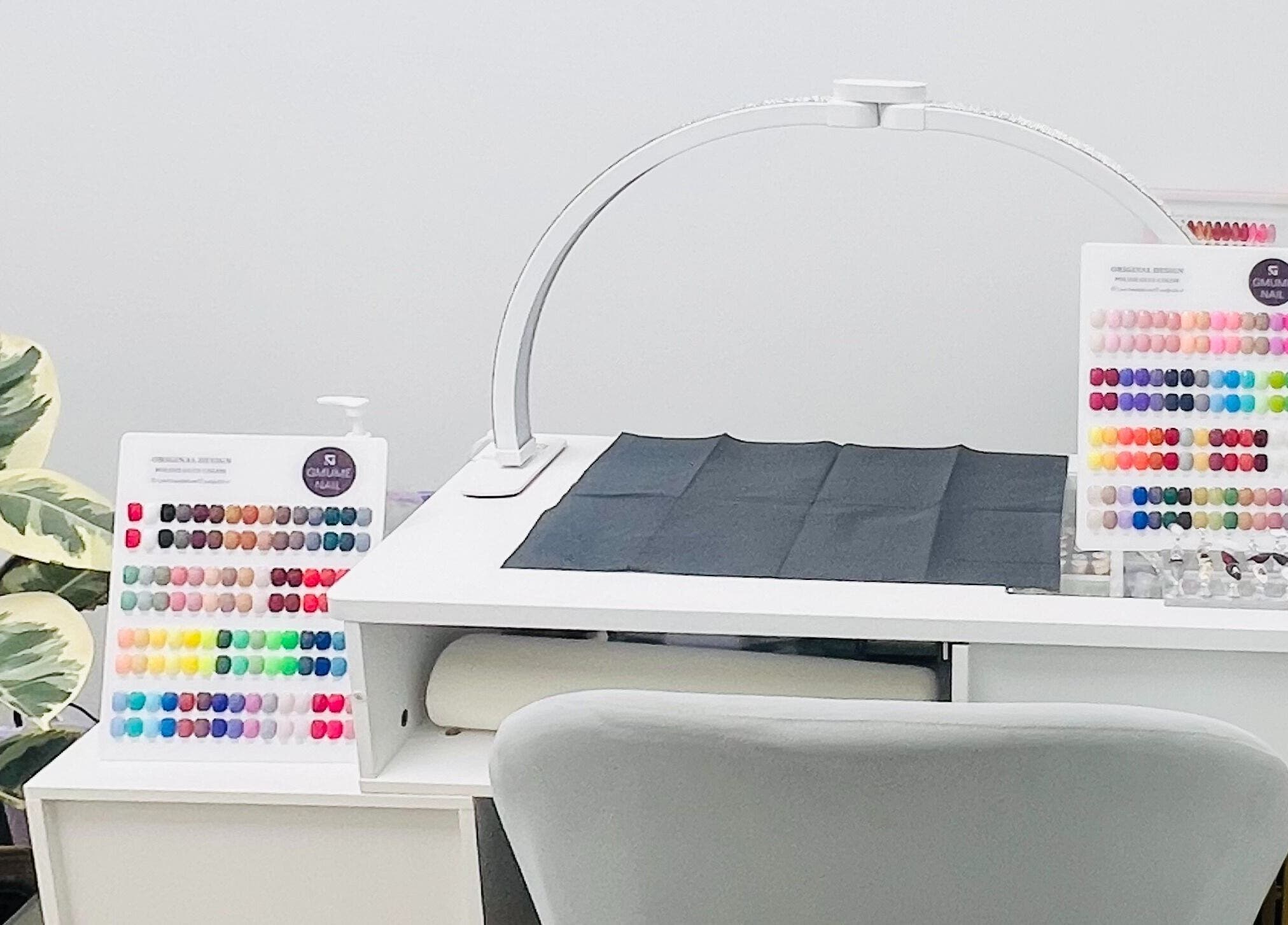 Nail polish selection at Phanlashtic & Nails Studio, Richmond, Texas, US, showcasing diverse color options.