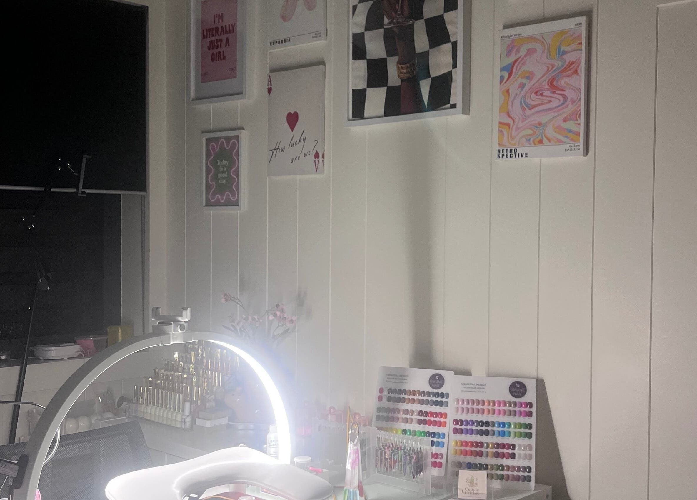 Cozy nail salon interior at Cuticle Cricket, Erskinville, New South Wales, AU with vibrant decor and nail polish display.