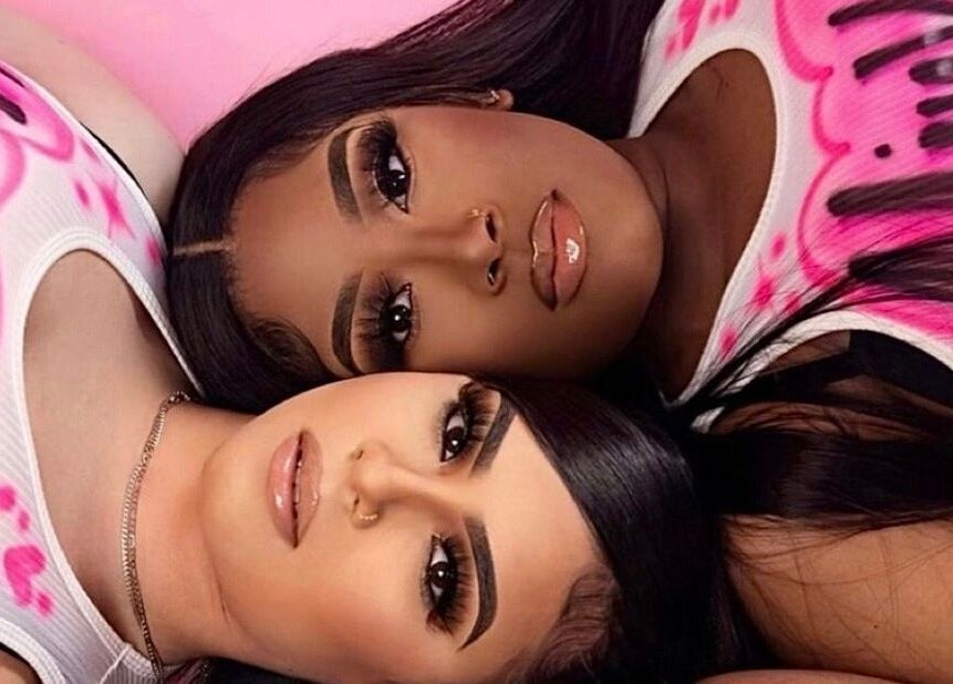 Two women with stylish lashes at Lashedbyacc, Edmonton, Alberta, CA, showcasing beauty and elegance.