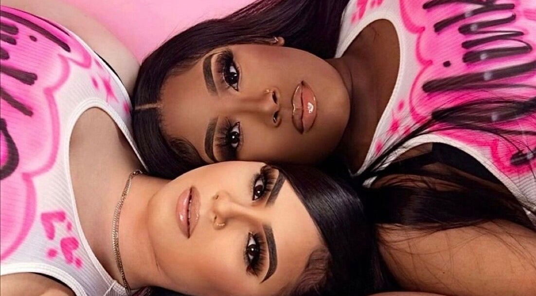 Two women with stylish lashes at Lashedbyacc, Edmonton, Alberta, CA, showcasing beauty and elegance.