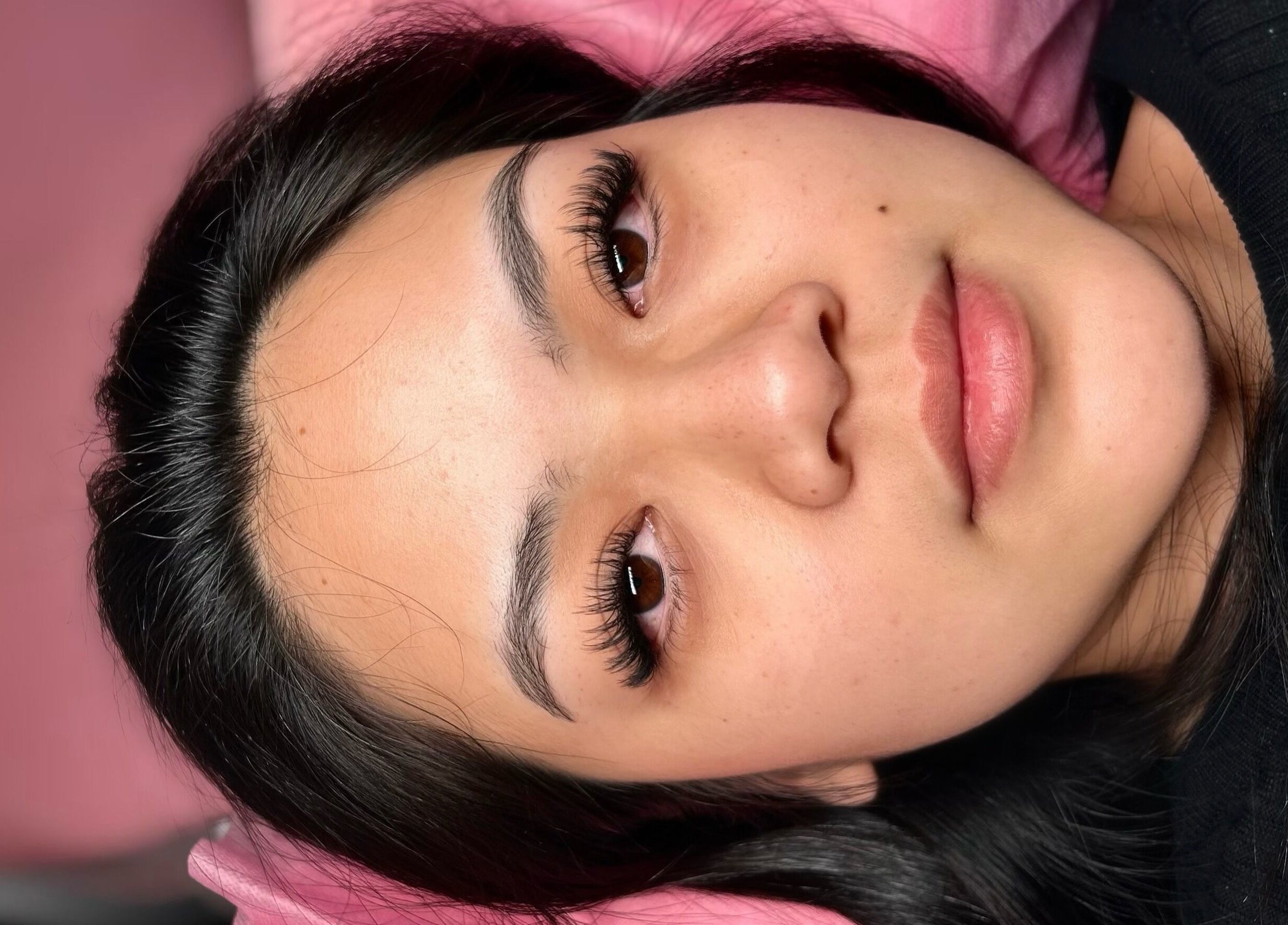 Client shows off stunning eyelash extensions at Lashedbyacc in Edmonton, Alberta, CA.