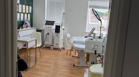 Beauty Poem's serene treatment room in Worcester, England, GB featuring modern aesthetic equipment and decor.