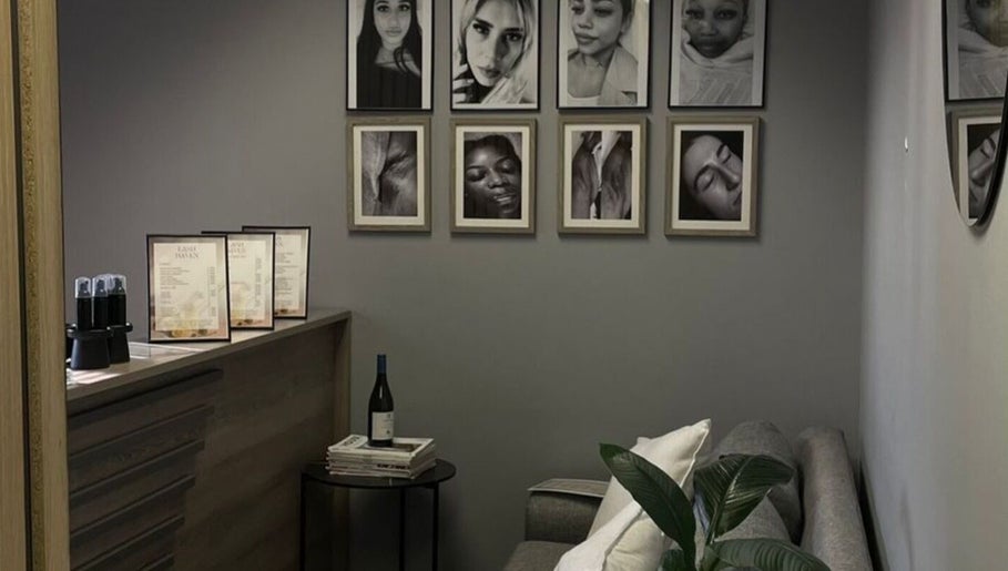 LuBelle Studio lounge with artistic portraits on walls, located in Randburg, Gauteng, ZA.