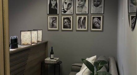 LuBelle Studio lounge with artistic portraits on walls, located in Randburg, Gauteng, ZA.