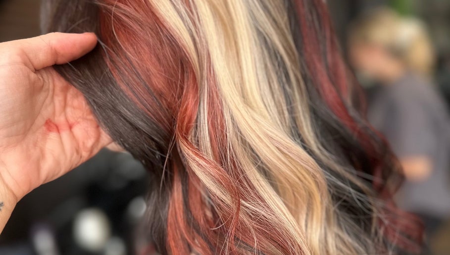 Close-up of vibrant multicolored hair styled at LMS HAIR, Welling, England, GB.
