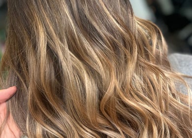 Smooth wavy golden hair styling at LMS HAIR in Welling, England, GB.