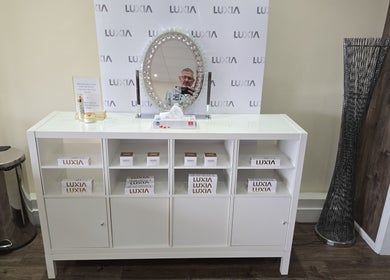 Luxia product display at Coolcontours, Windsor, England, GB featuring mirror and storage.