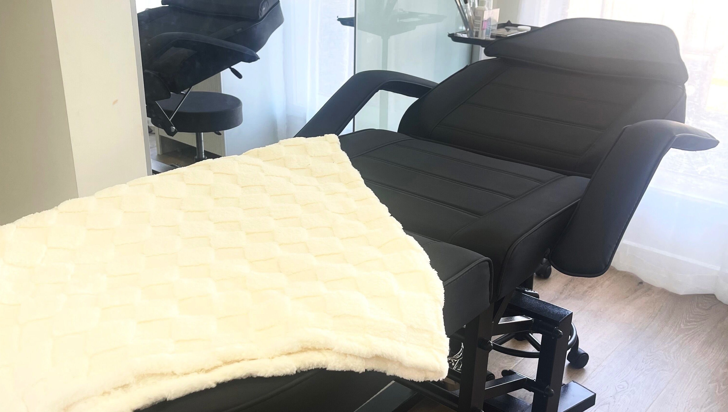 Comfortable treatment chair at TW BROWS, Claremont Meadows, New South Wales, AU for premium beauty services.