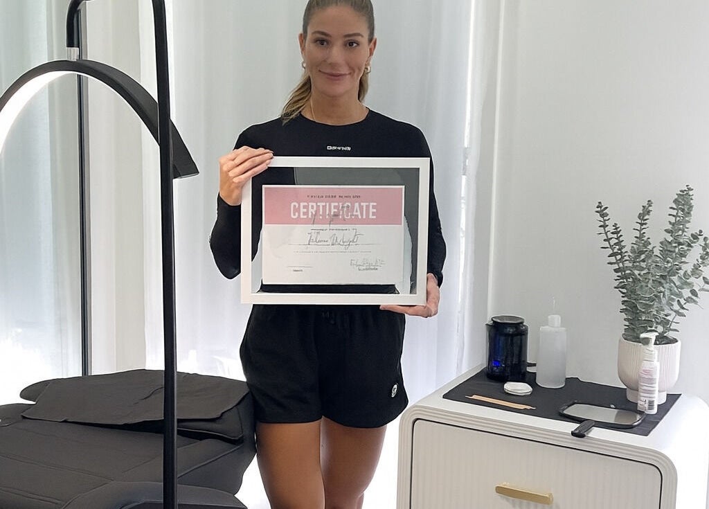 TW BROWS staff with certification in Claremont Meadows, New South Wales, AU beauty services room.