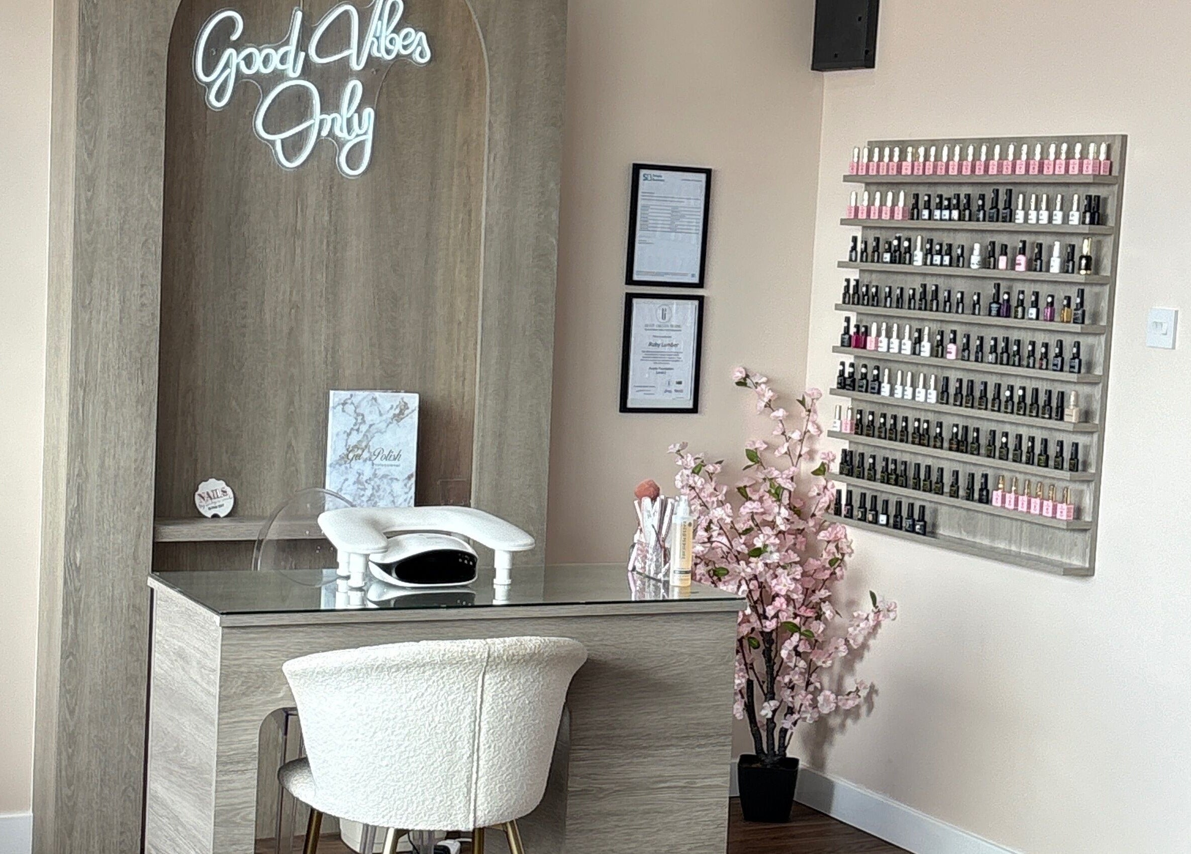 Elegant nail salon at The Pink Edit, Bournemouth, England, GB, with a stylish setup and floral decor.