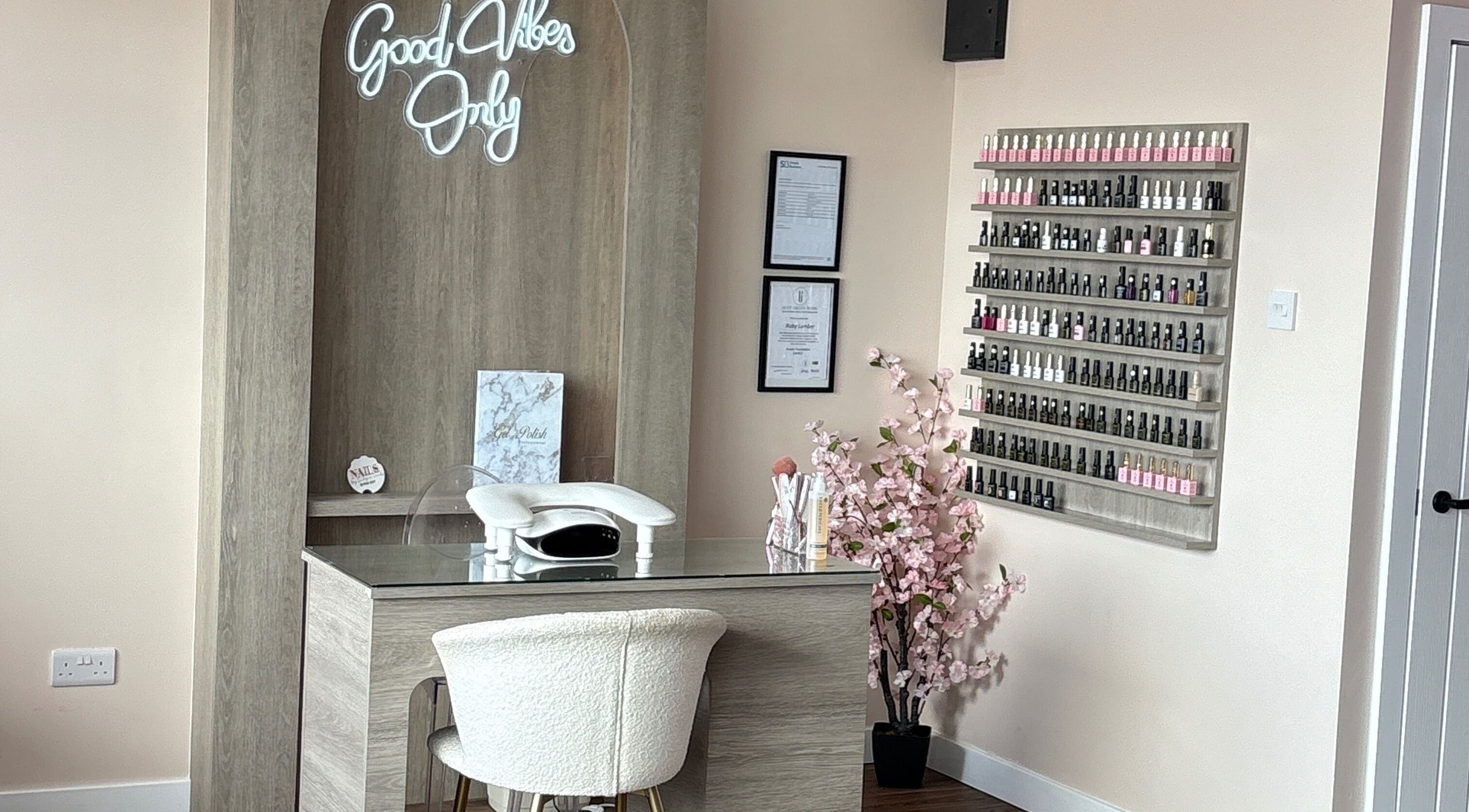 Elegant nail salon at The Pink Edit, Bournemouth, England, GB, with a stylish setup and floral decor.