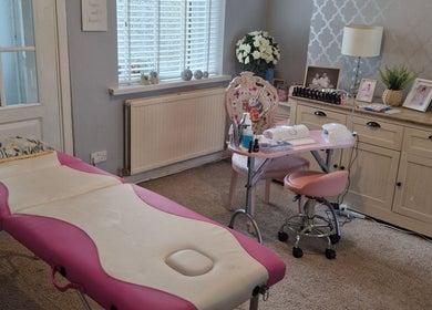 Peaceful treatment room at Beauty by Cassie, Pengam, Wales. Features cozy decor and stylish furniture.