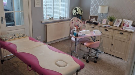 Peaceful treatment room at Beauty by Cassie, Pengam, Wales. Features cozy decor and stylish furniture.