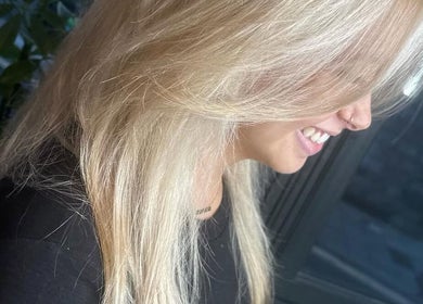 Stylish blonde hair transformation at BlondeBliss, Aberdeen, Scotland, GB. Perfect for a fresh new look.
