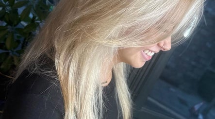 Stylish blonde hair transformation at BlondeBliss, Aberdeen, Scotland, GB. Perfect for a fresh new look.