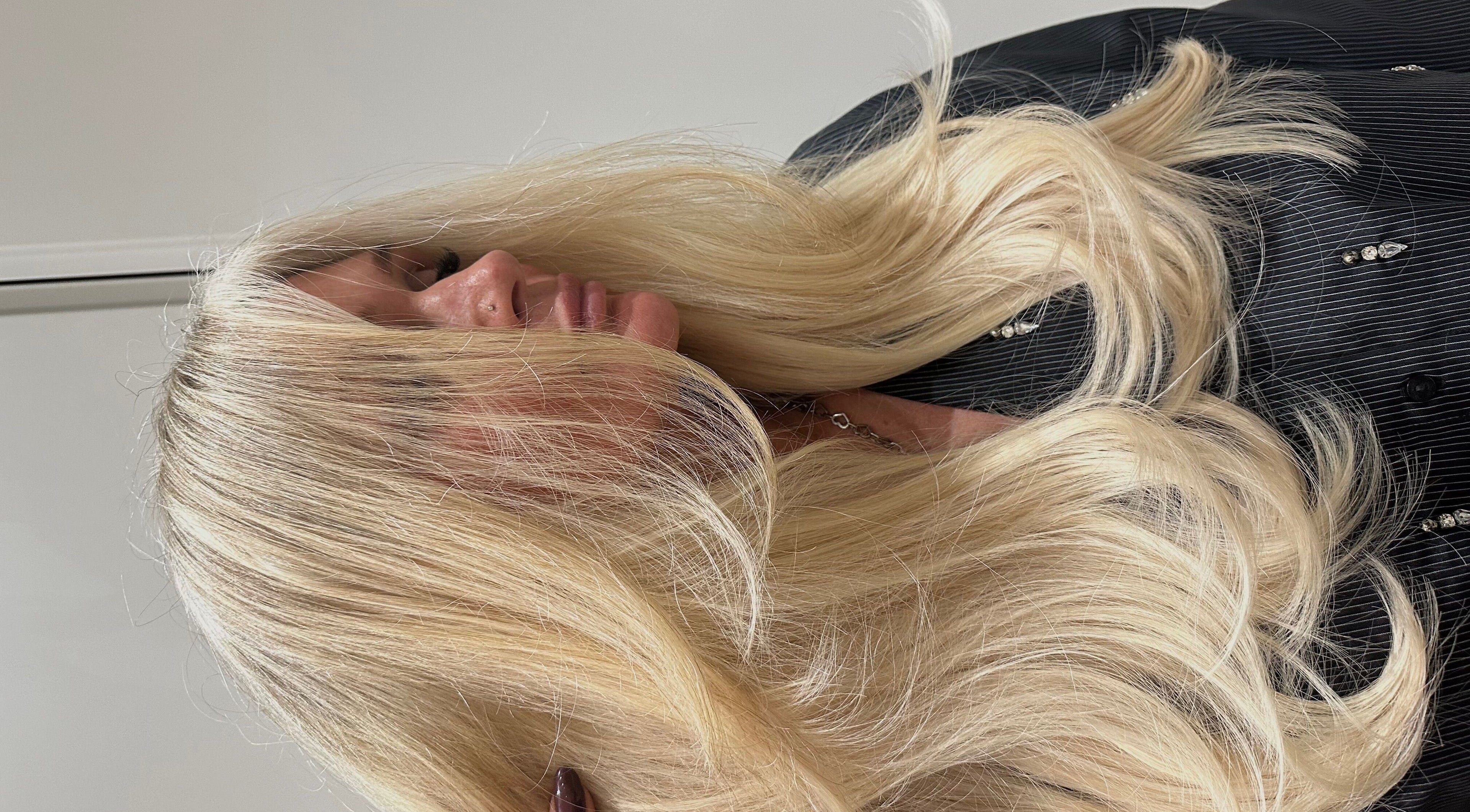 Close-up of silky blonde hair styled at Blonde Bliss, Aberdeen, Scotland, GB.