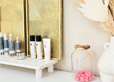 FaceFIT With Lauren skincare products on display in Inverness, Scotland, GB with golden decor.