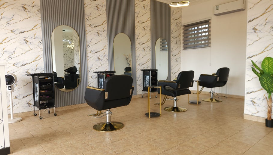 Elegant salon at Ash Hair Story, Accra, Greater Accra Region, GH with modern design and stylish chairs.