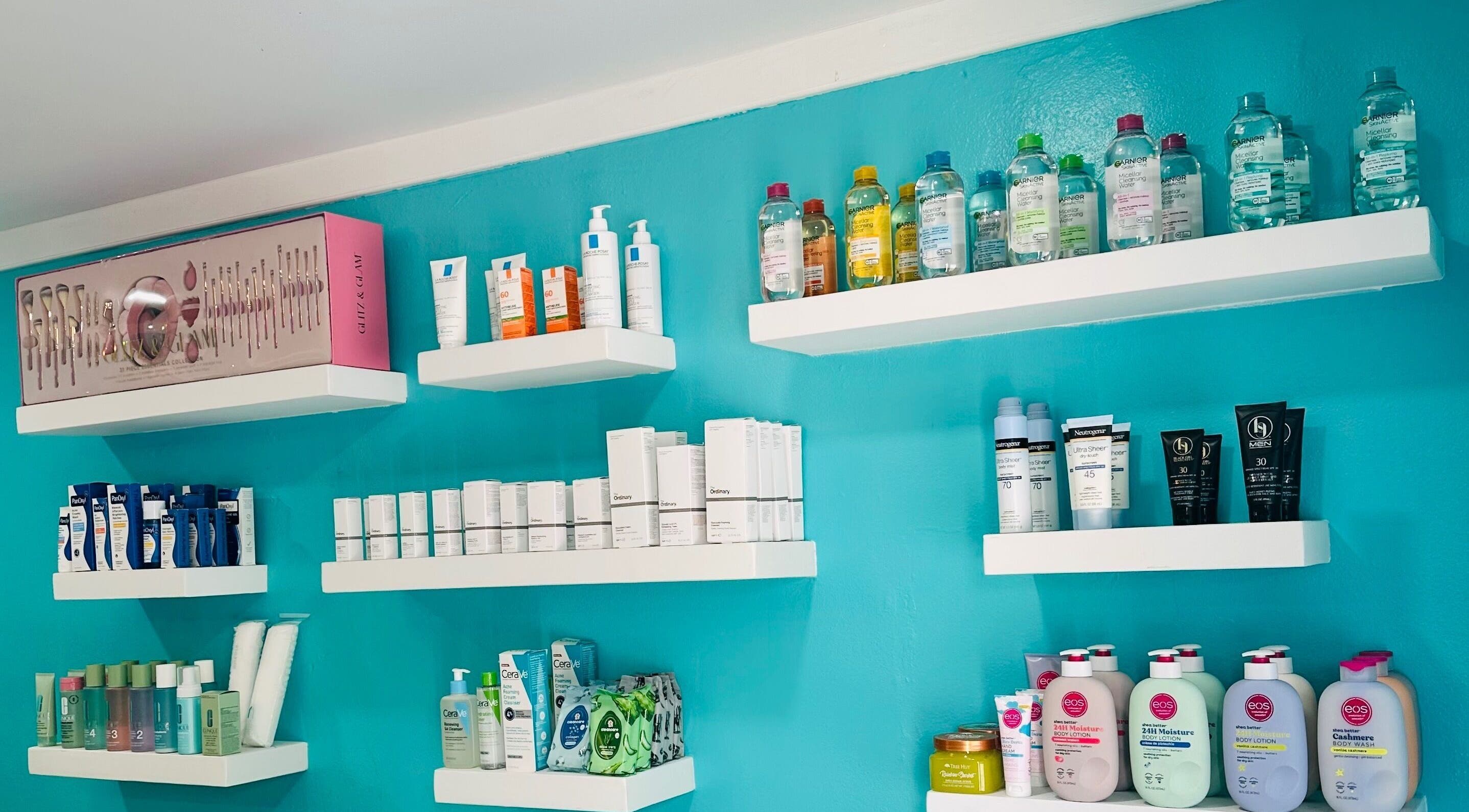Diverse skincare products on shelves at Hair Infirmary242, Nassau, New Providence, BS.