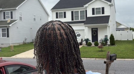 Stylish braids from Braidsboss_Gh in Salisbury, Maryland, US. Showcasing intricate hair design.