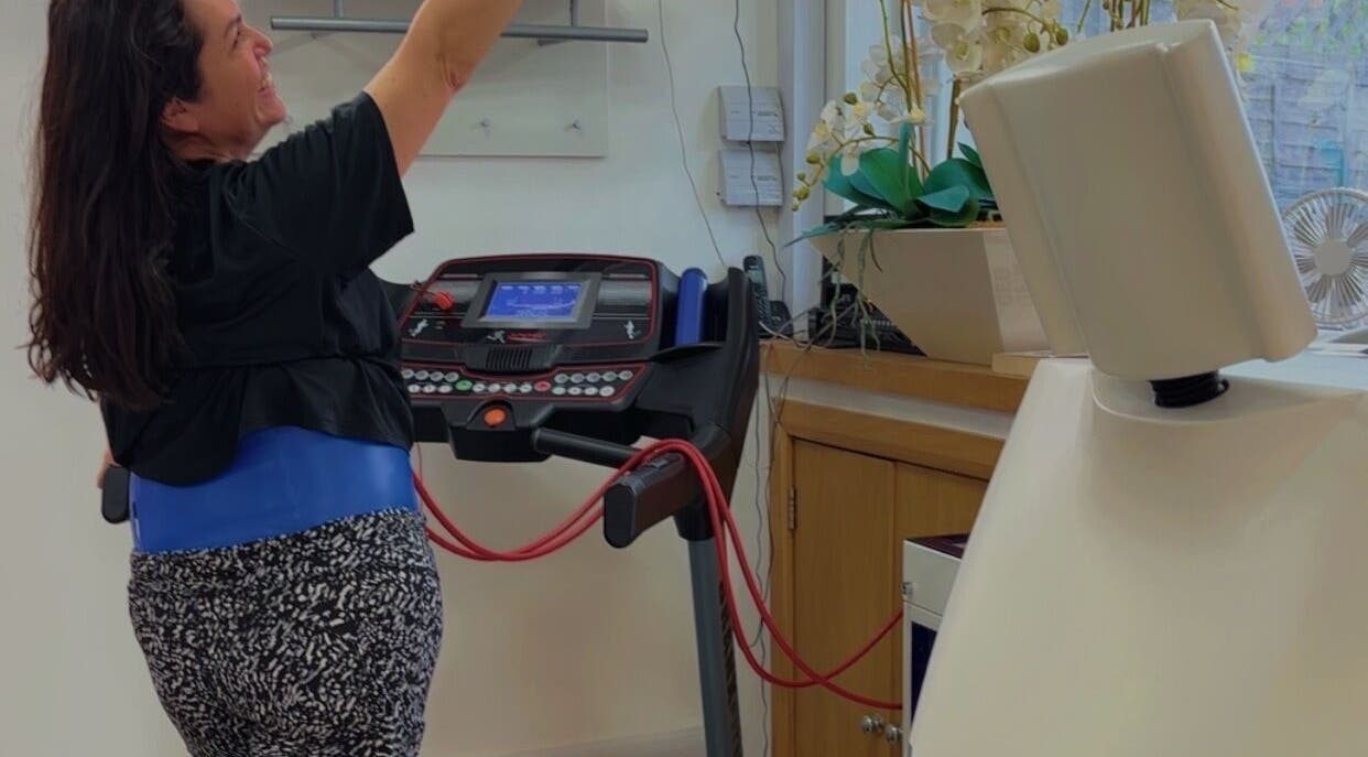 Woman using exercise equipment at Hypoxi Slim Suite, Ascot, England, GB.