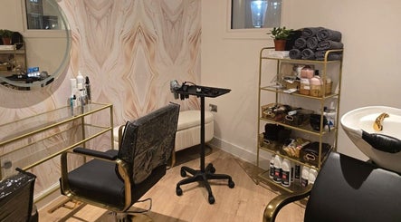 Elegant styling area at Sama London Hair Studio, London, England, GB, featuring modern decor and vibrant ambiance.