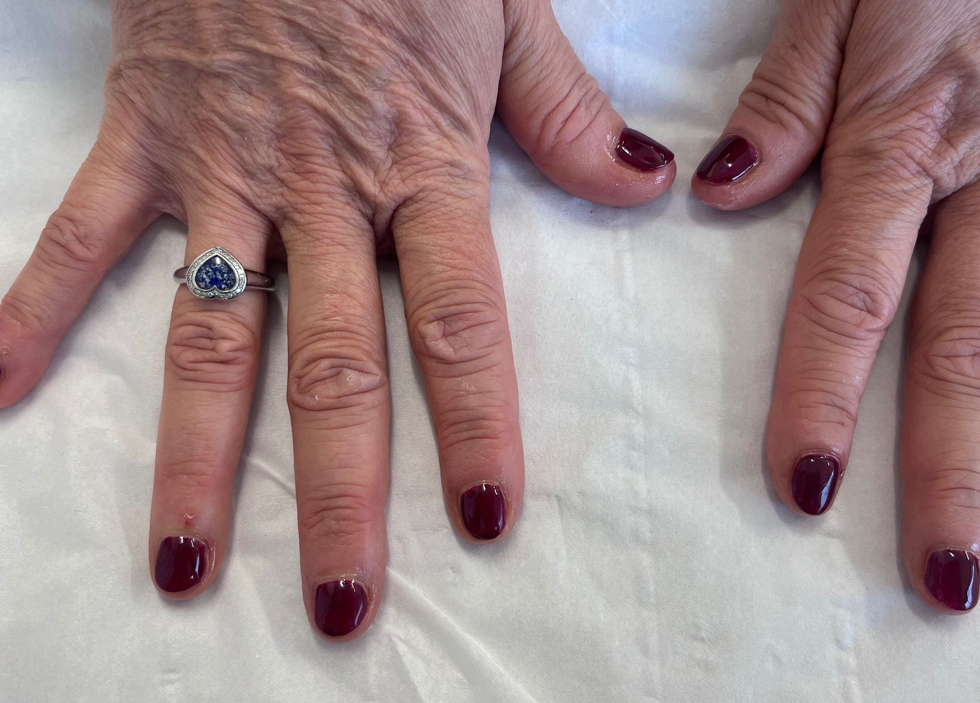 Beautiful red manicured nails at Lashes with Teri, Wolverhampton, England, GB.