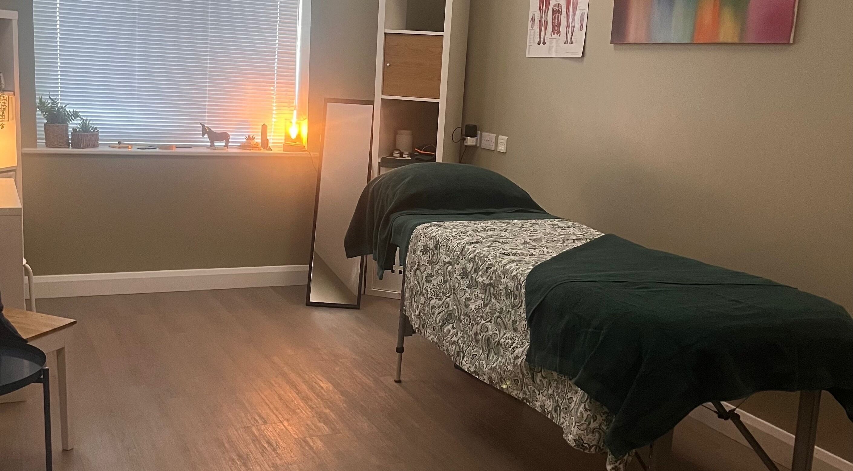 Calm therapy room at Lindsey Graham Physio & Holistics, Chester-le-Street, England, GB, with cozy treatment bed.