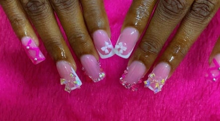 Detailed pink and crystal nail art at Anna Nail Bar, Montego Bay, St. James Parish, JM.
