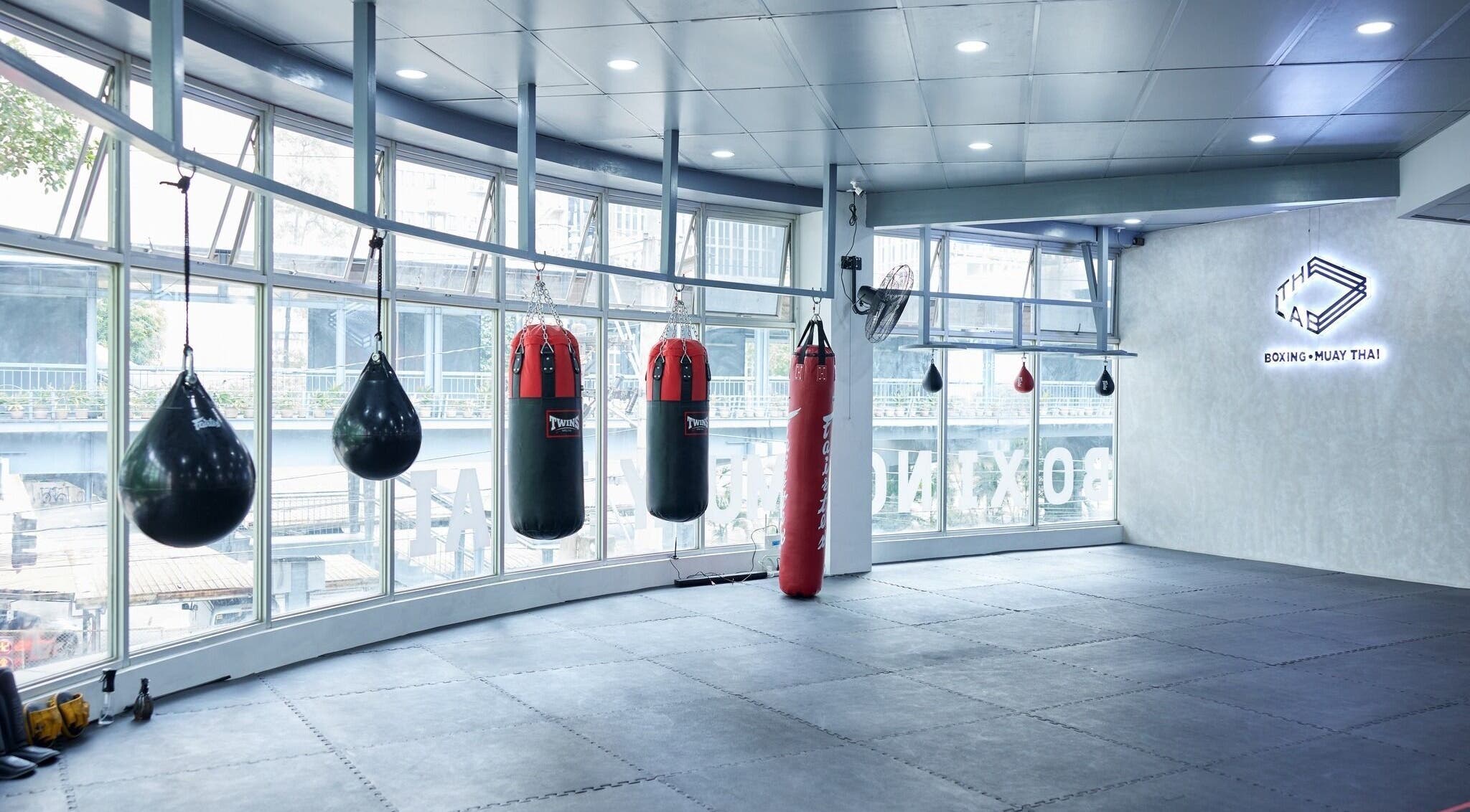 Spacious training area with punching bags at The Lab Boxing & Muay Thai gym - MAKATI, Makati City, Metro Manila, PH.