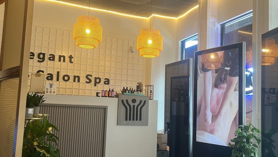 Interior of ELEGANT HEAD SPA in South Pasadena, California, US featuring cozy lighting and lush greenery.