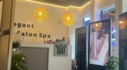 Interior of ELEGANT HEAD SPA in South Pasadena, California, US featuring cozy lighting and lush greenery.