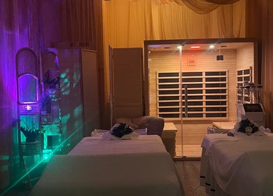 Tranquil interior of ELEGANT HEAD SPA in South Pasadena, California, US with ambient lighting and massage tables.