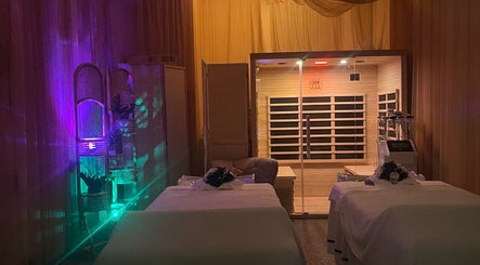 Tranquil interior of ELEGANT HEAD SPA in South Pasadena, California, US with ambient lighting and massage tables.