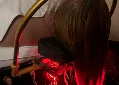 Revitalizing hair treatment at ELEGANT HEAD SPA, South Pasadena, California, US with glowing red ambiance.