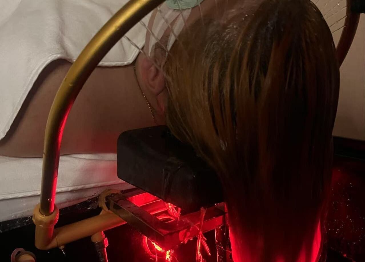 Relaxing scalp treatment at Elegant Scalp Spa in South Pasadena, California, US with soothing light therapy.