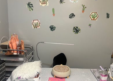 Nail art workspace at Gelxnailsbydiana_92, featuring tools and decor, located in Justice, Illinois, US.