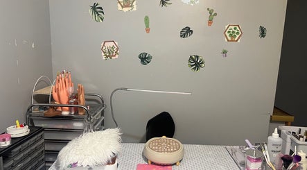 Nail art workspace at Gelxnailsbydiana_92, featuring tools and decor, located in Justice, Illinois, US.