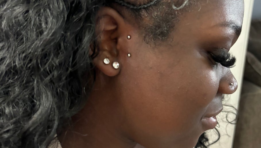 Detailed image of elegant ear piercings at Dreams Vanity, Philadelphia, Pennsylvania, US.