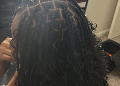 Detailed braided hairstyle at Dreams Vanity, Philadelphia, Pennsylvania, US. Showcasing intricate hair design.