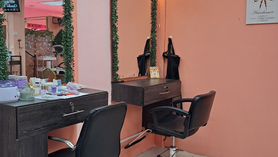 Elegant salon station at Zach Hair, Arima, Arima Borough Corporation, TT, featuring modern styling tools.
