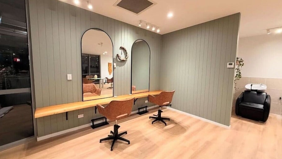 Modern interior of The Fox & Dandelion Hair Bar 🦊🌼 in Maroochydore, Queensland, AU featuring styling chairs and mirrors.