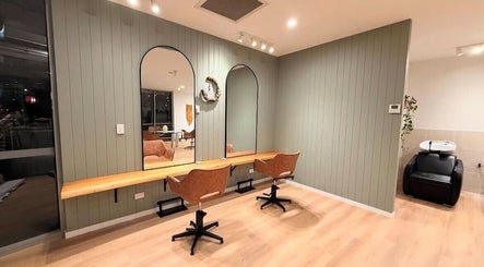 Modern interior of The Fox & Dandelion Hair Bar 🦊🌼 in Maroochydore, Queensland, AU featuring styling chairs and mirrors.