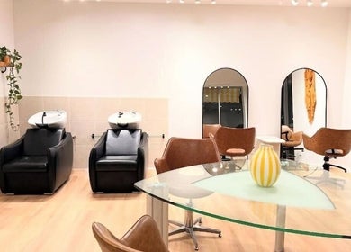 Modern interior at The Fox & Dandelion Hair Bar 🦊🌼 in Maroochydore, Queensland, AU features stylish salon chairs and mirrors.