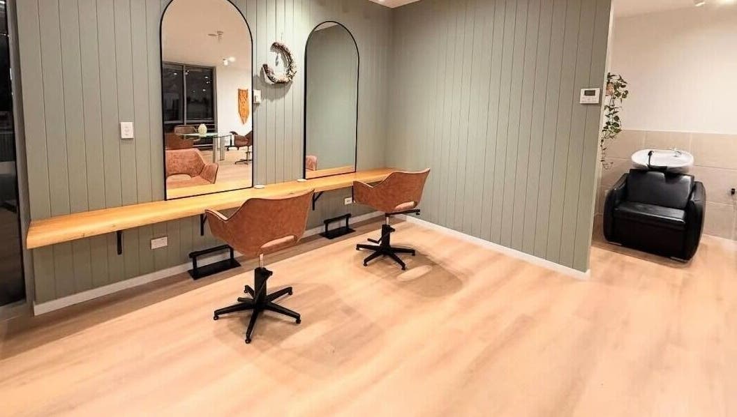 Chic styling area at The Fox & Dandelion Hair Bar, Maroochydore, Queensland, AU. Two mirrors and chairs.