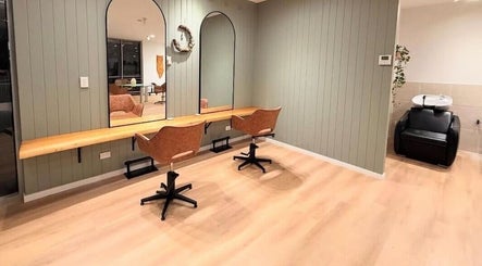 Chic styling area at The Fox & Dandelion Hair Bar, Maroochydore, Queensland, AU. Two mirrors and chairs.